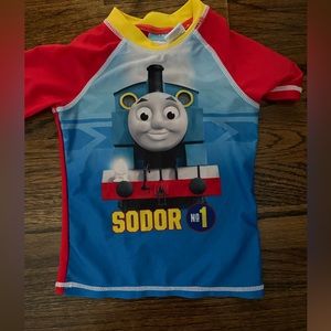 Boys 2t short sleeved rash guard spf 50. Spider man and Thomas.